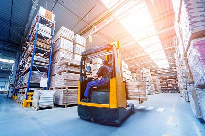 Warehouse loading docks, distribution center and pallets ready for distribution